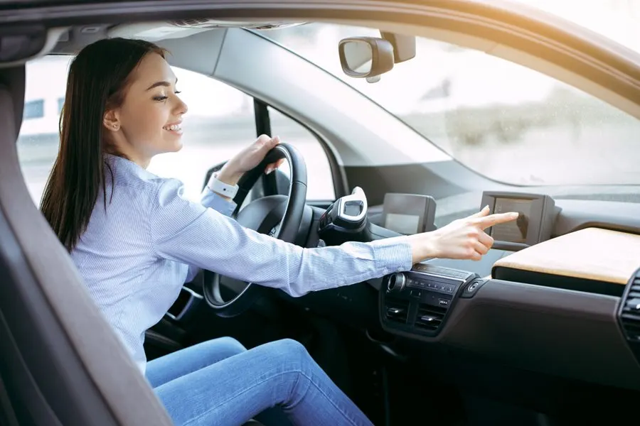 Woman In Electric Car