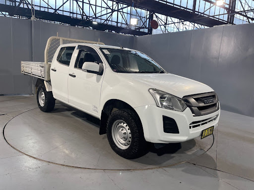 white isuzu ute